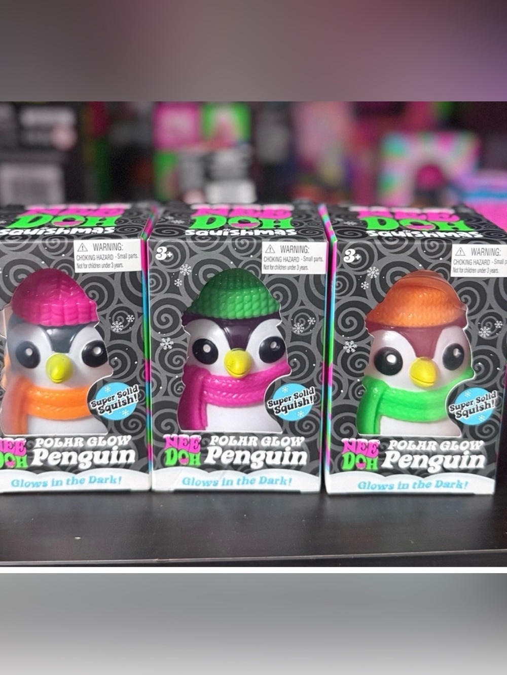 NeeDoh SET OF 3- Polar Glow Penguin Squishies - Pink, Orange, Green